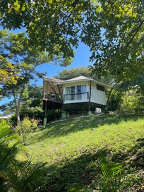 Taken from the hiking path, this was our bungalow. Heard distant Howler monkey noises every morning!