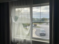 Torn and missing curtains.