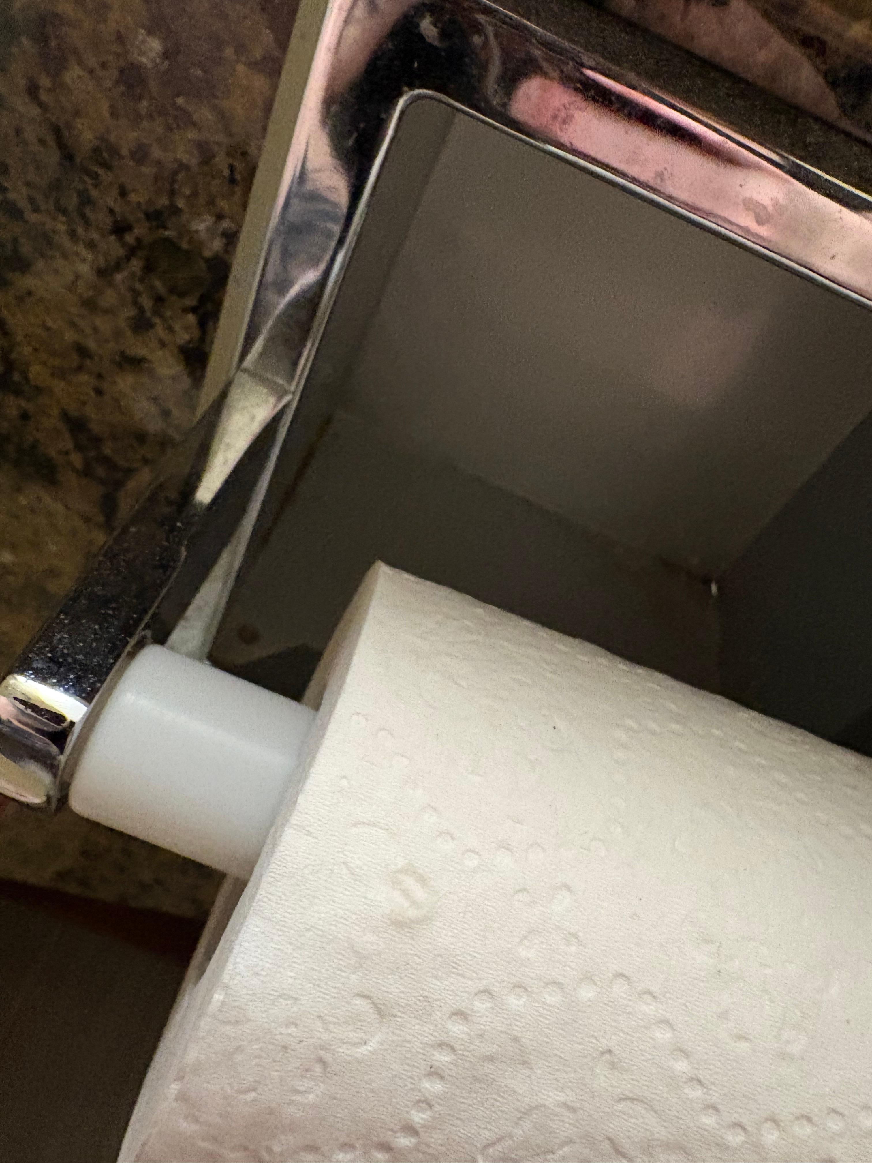 Inside of the paper holder is very dusty 