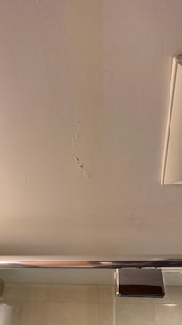 Paint chipping / peeling in parts of the room