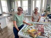 This great table was at the house. Great for puzzles.