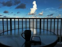 Coffee, reading on the balcony.
