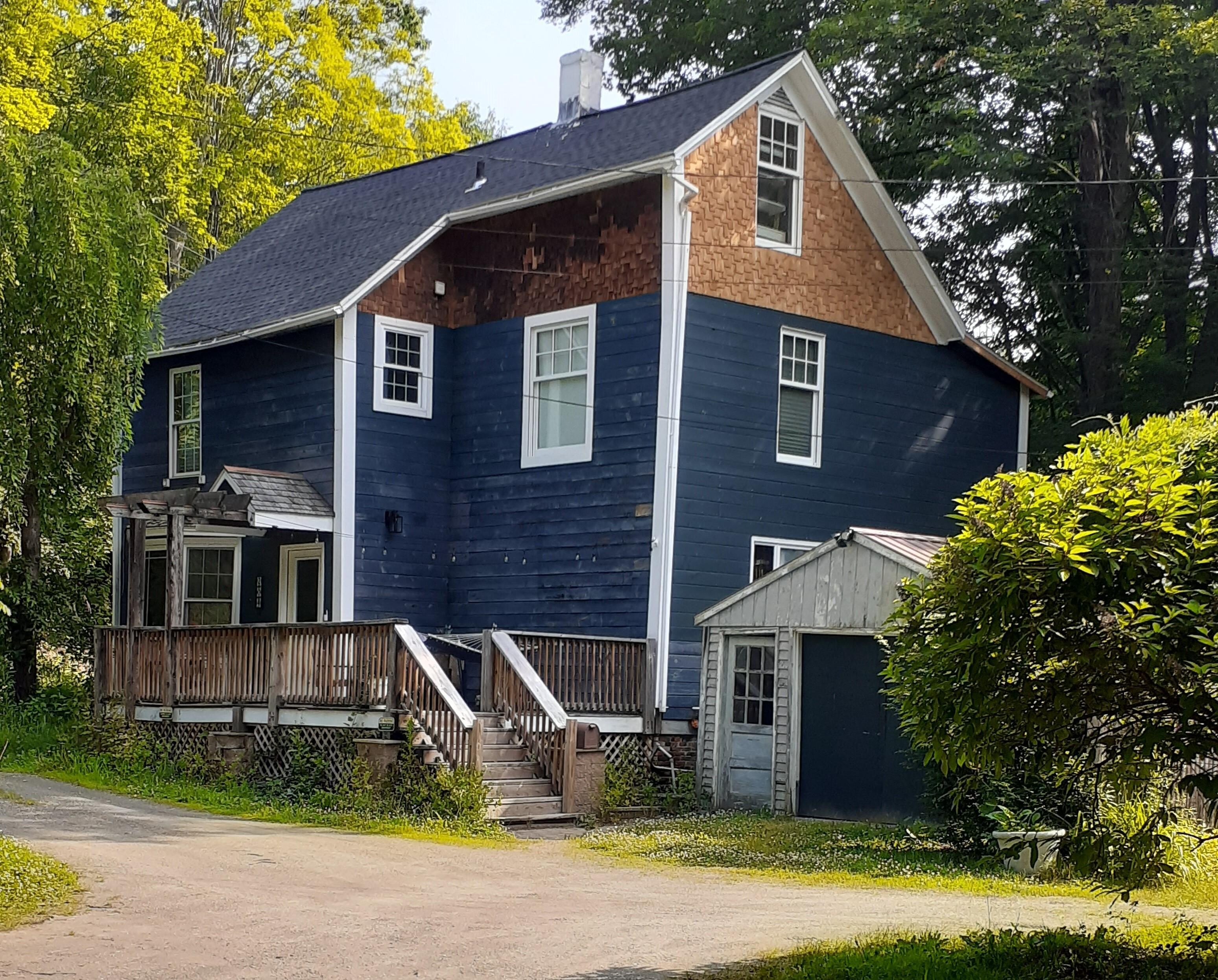 The exterior, viewed from the lawn. It really doesn't do the interior justice!