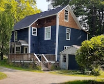 The exterior, viewed from the lawn. It really doesn't do the interior justice!