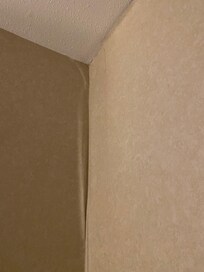 Wallpaper peeling off the walls