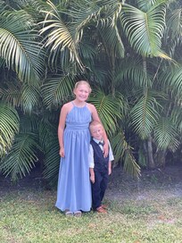 Our grands were the flower girl and ring bearer. This was taken in the backyard of the home.