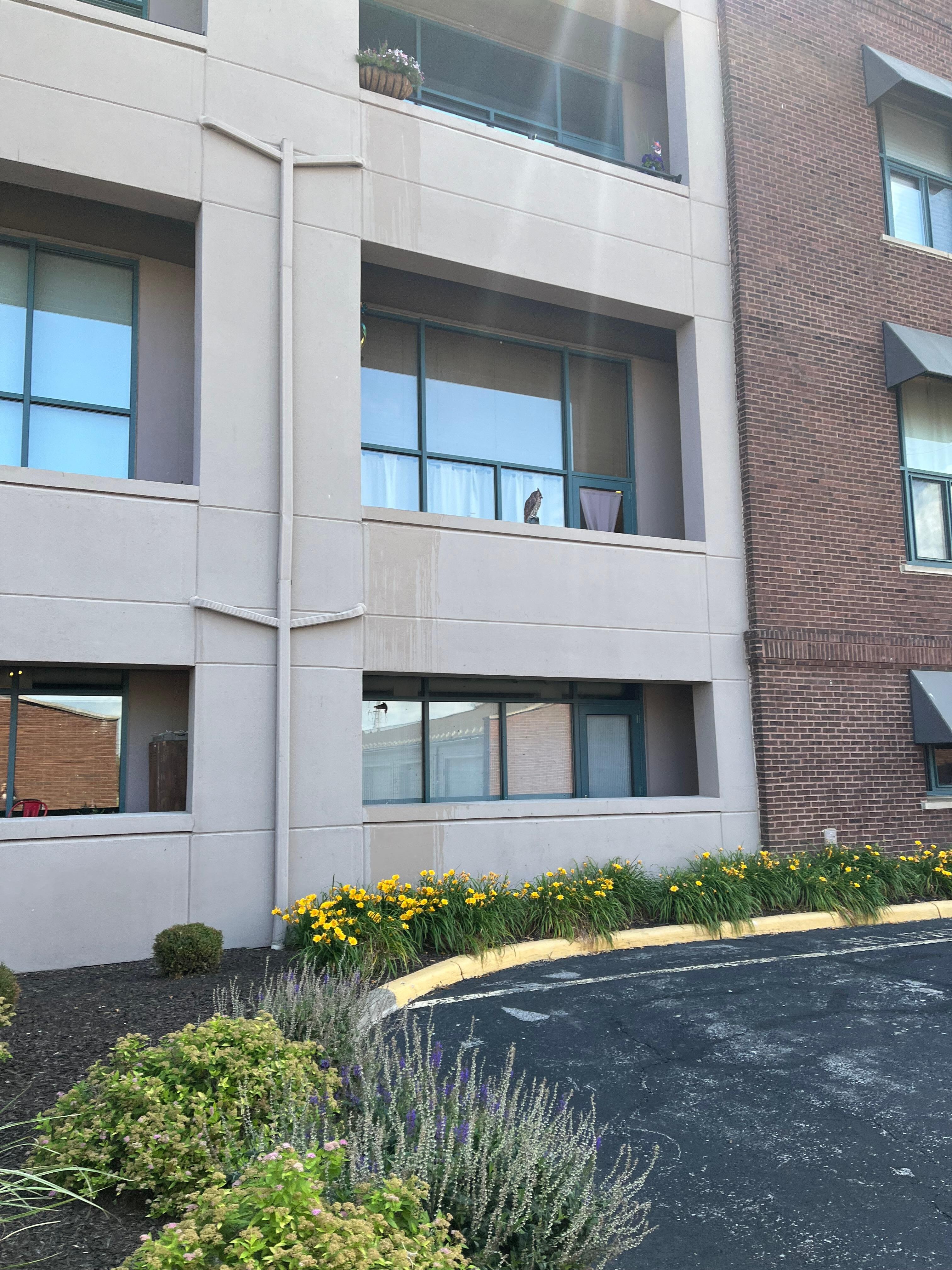 Angie, if you look closely at the left side of porch, flowers watered from above runs on the outside from 3rd floor to bottom, along your rail and chair, including on your visitors multiple times a week.