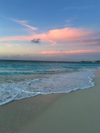 Easily see the sunset from the property beach chairs.