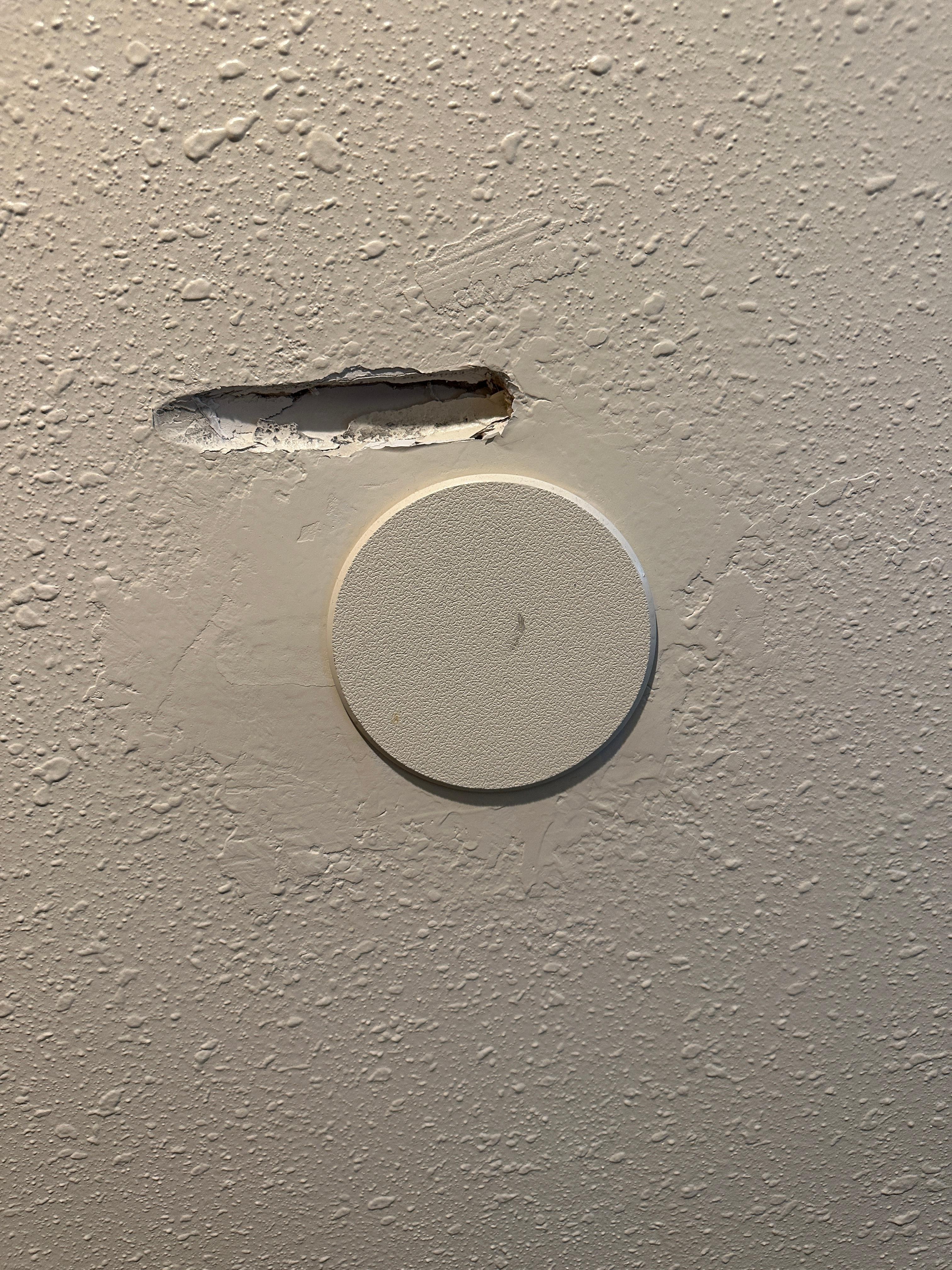Sheet Rock Damage by Door Handle