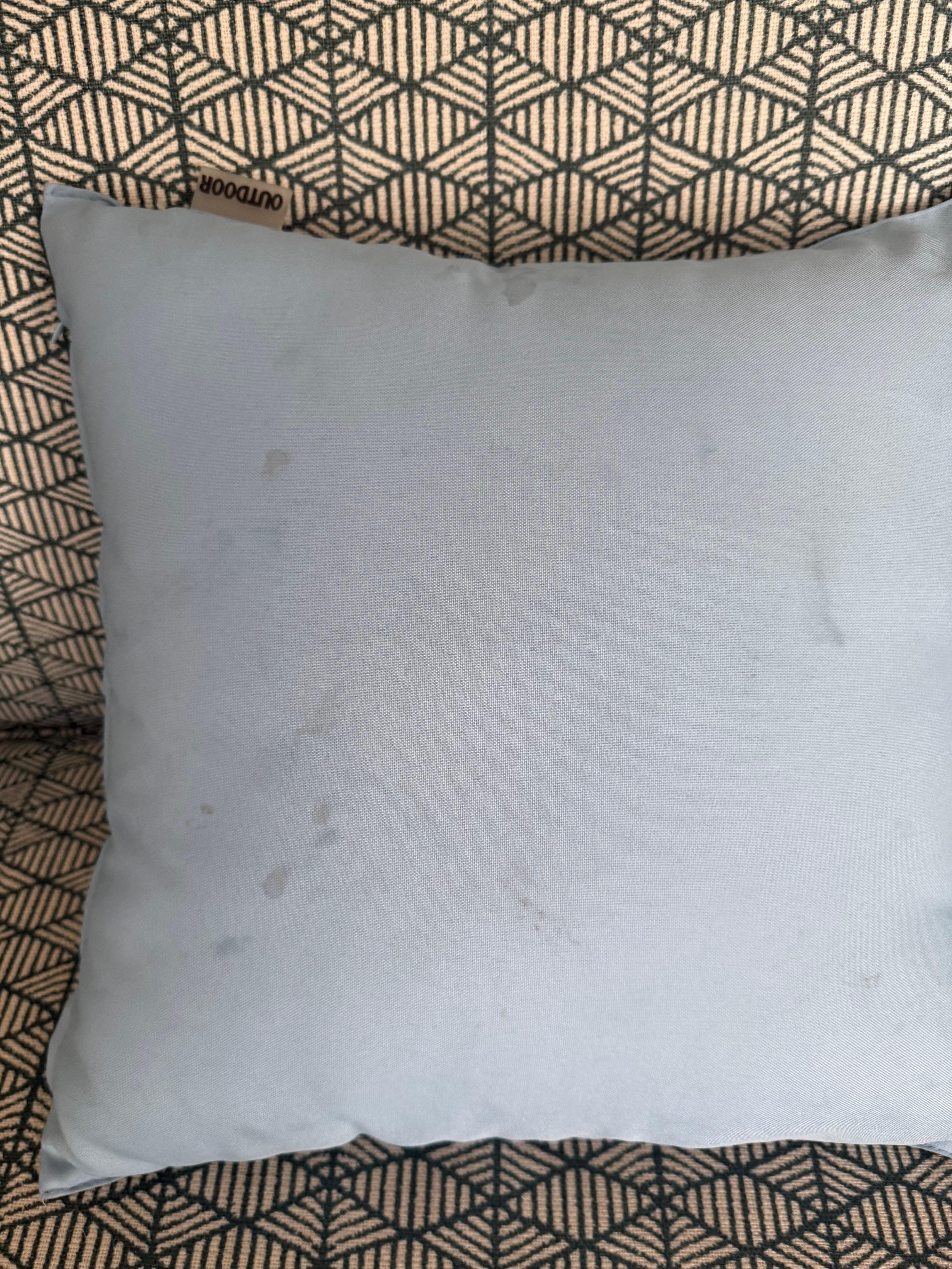 Dirty pillow in chair