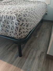 King Size bed on a metal platform