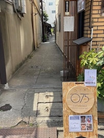The, very Japanese, coffee shop with very Japanese 'pancakes' and curry breakfast. Down the alley, on the left.