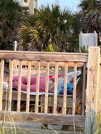 Homeless sleeping on beach access