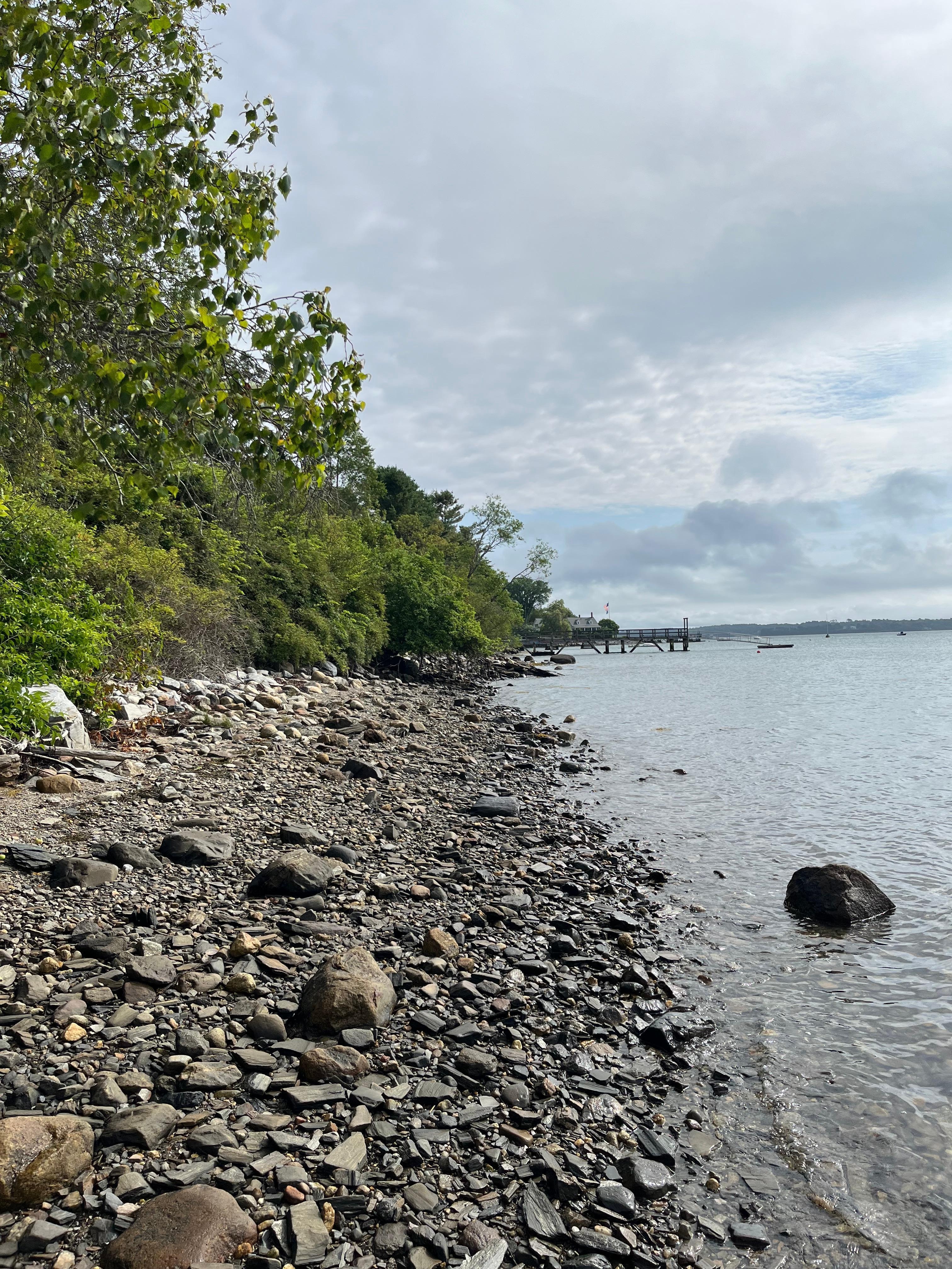Pebbly beach below Grace’s Place