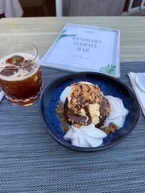 Drinks and dessert at rooftop bar