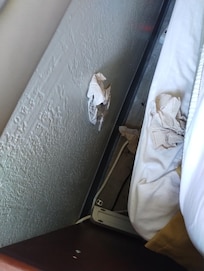Used napkins behind bed
