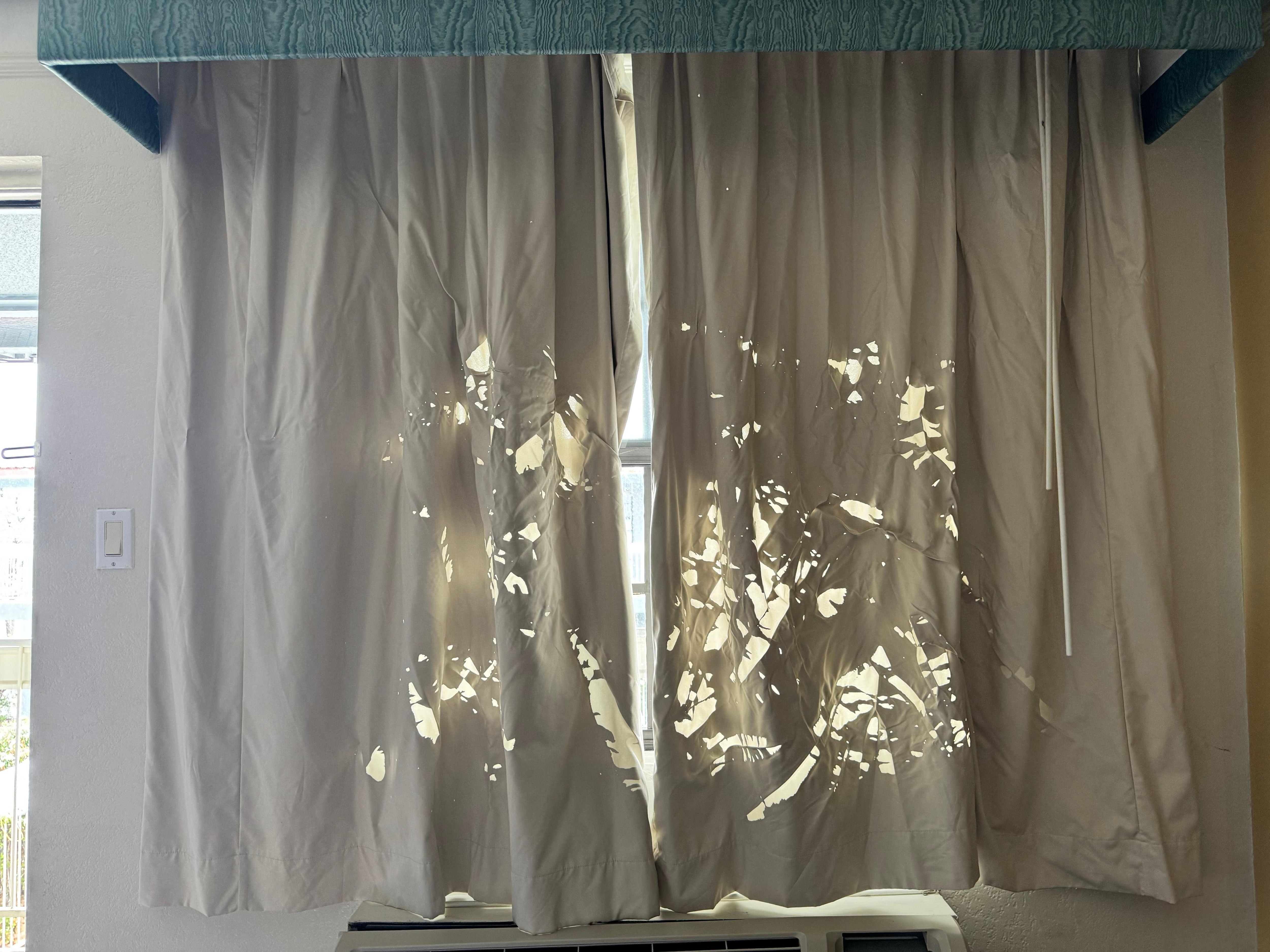 The MOST privacy I could manage from the decrepit blinds, NO Curtains 