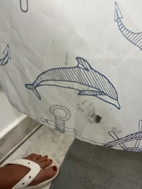 Stained shower curtain