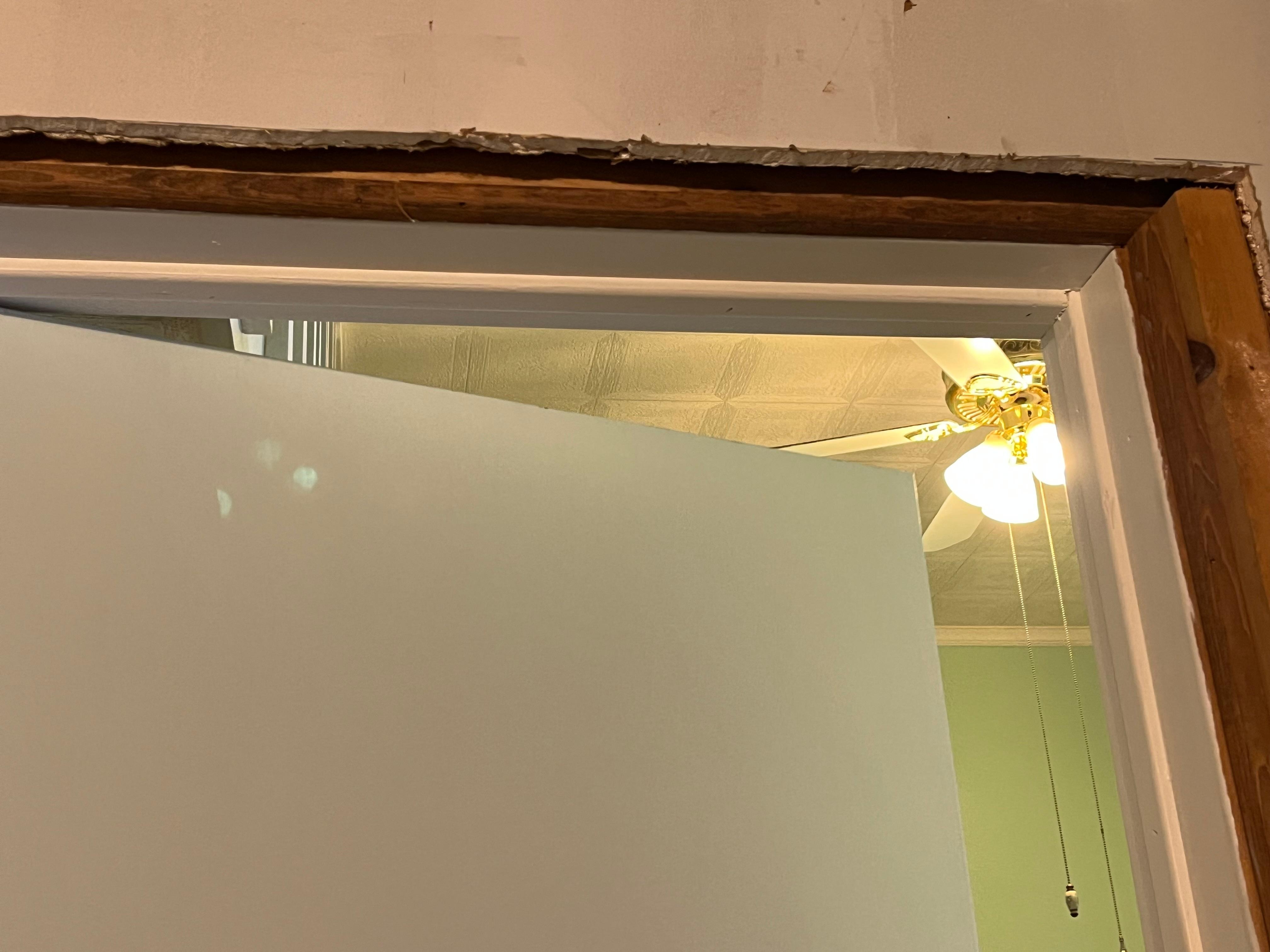 No molding around the bathroom door. 