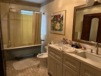 Bathroom with claw bath tub shower curtain and nothing help a slippery wet person out of tub