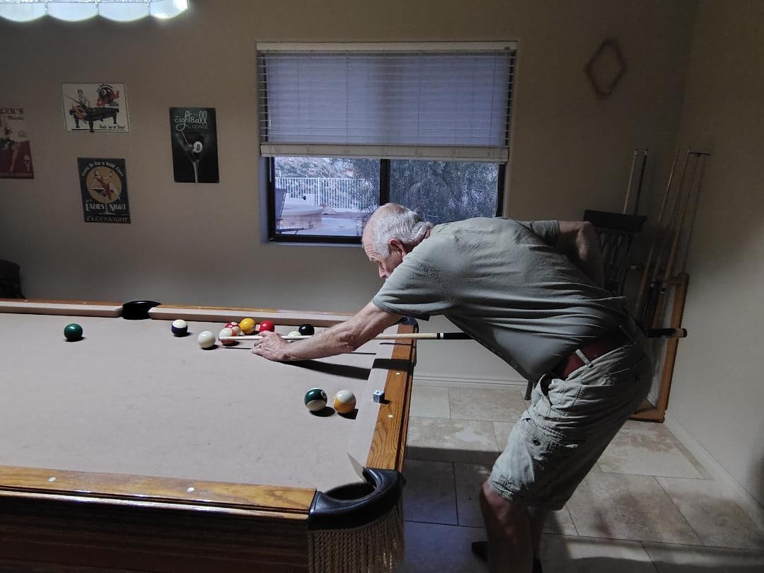 Enjoying the pool table in the living area!