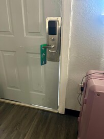 Door did not shut completely. Evidence shows that the door had been previously kicked in.