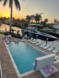 The view from the master bedroom balcony overlooking the pool and intercostal