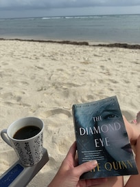Reading on the beach, around 7am. Total quiet except for the waves and a few birds.