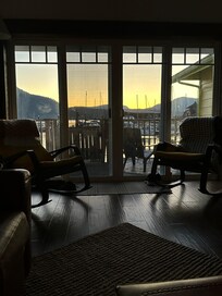 Cowibbean Cottage view out living room patio doors.