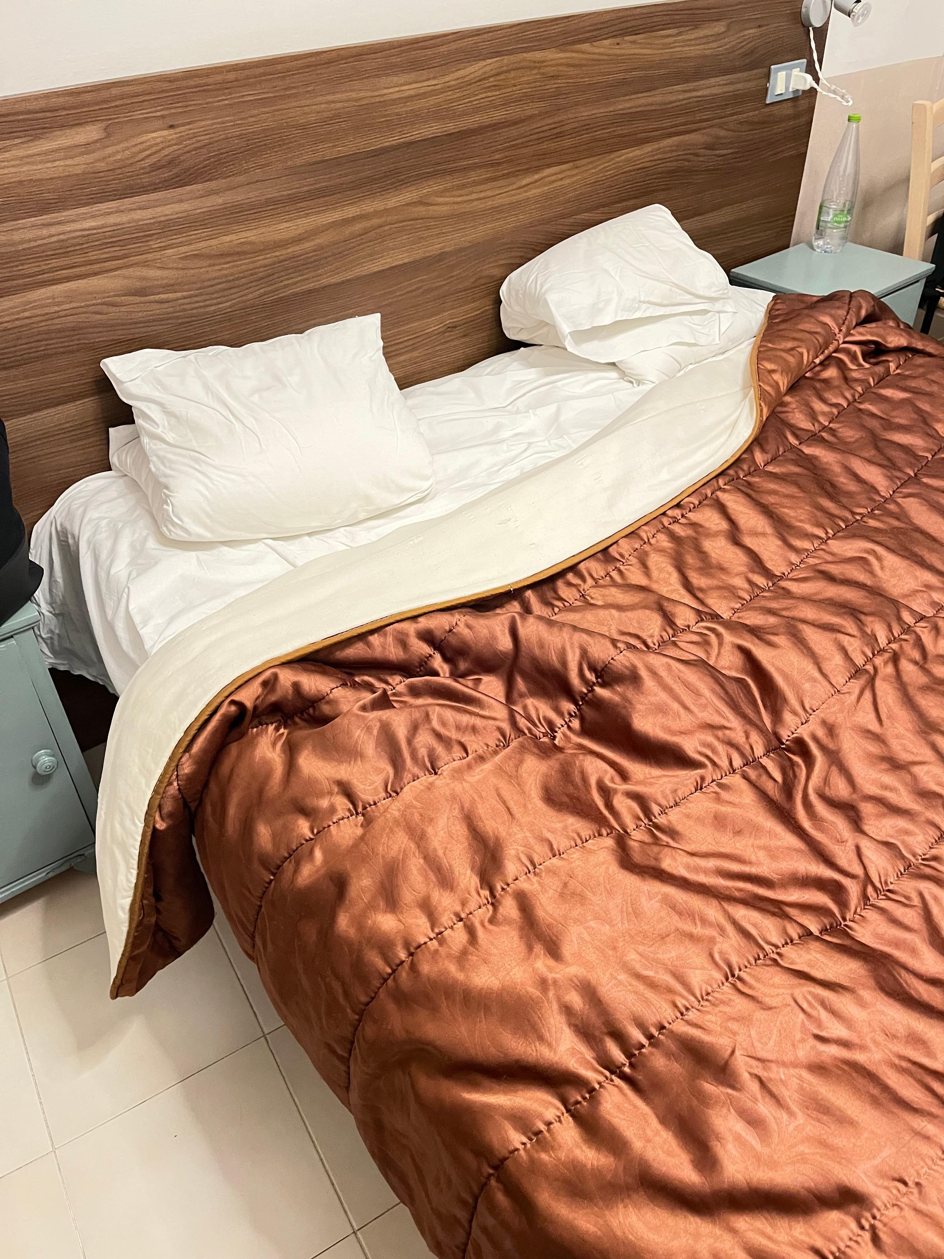 That’s the bed, thin pillow and old hard mattress