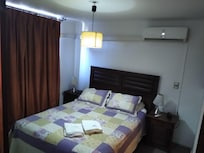 Habitación con Aire acondicionado y TV