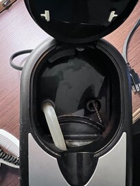 there's a screw inside the coffee machine