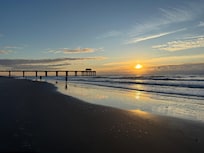 Sunrise by the pier - from our balcony!