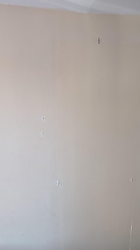 Holes in the wall.