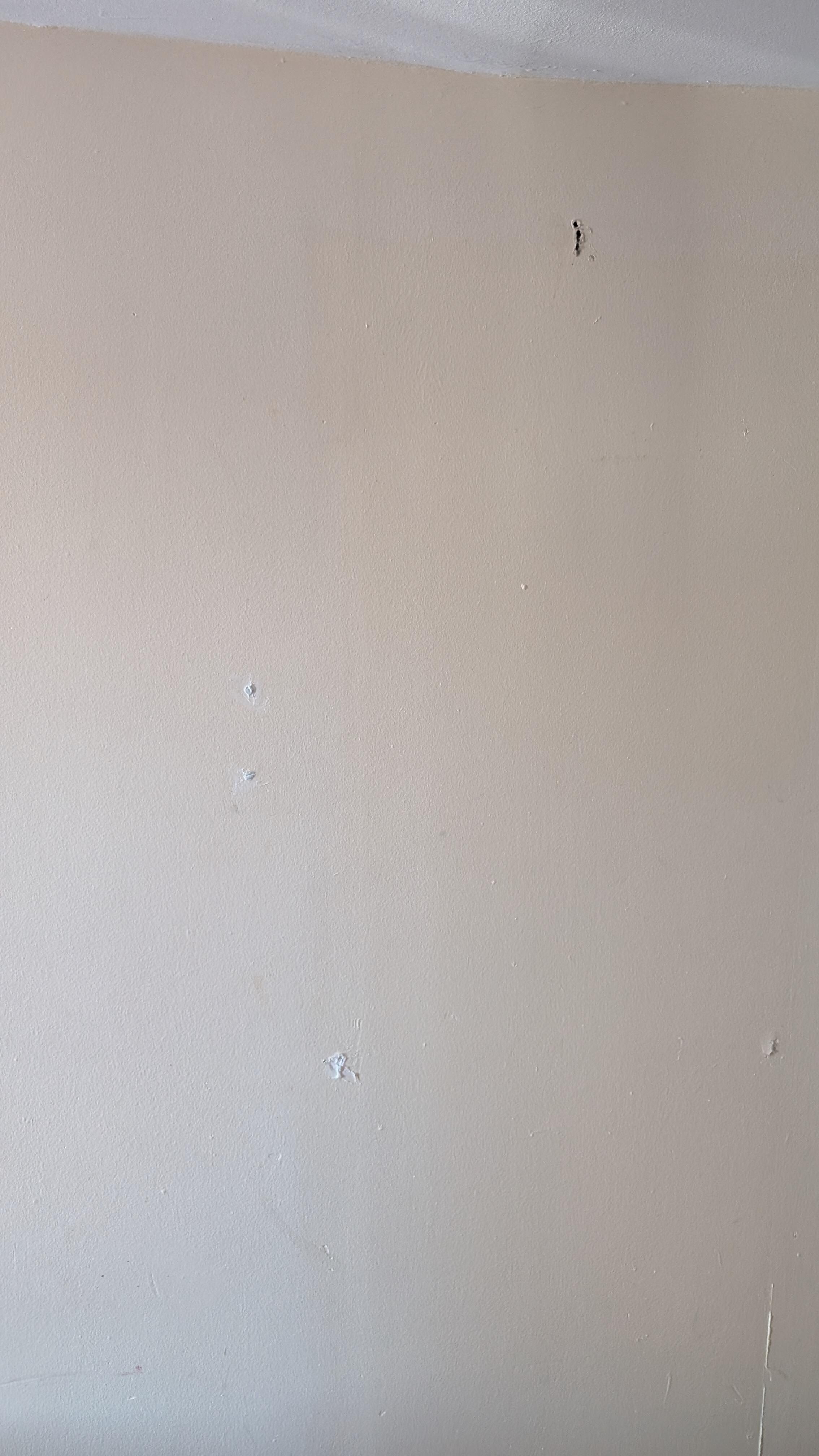 Holes in the wall.