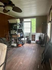 Owner's junk on porch.