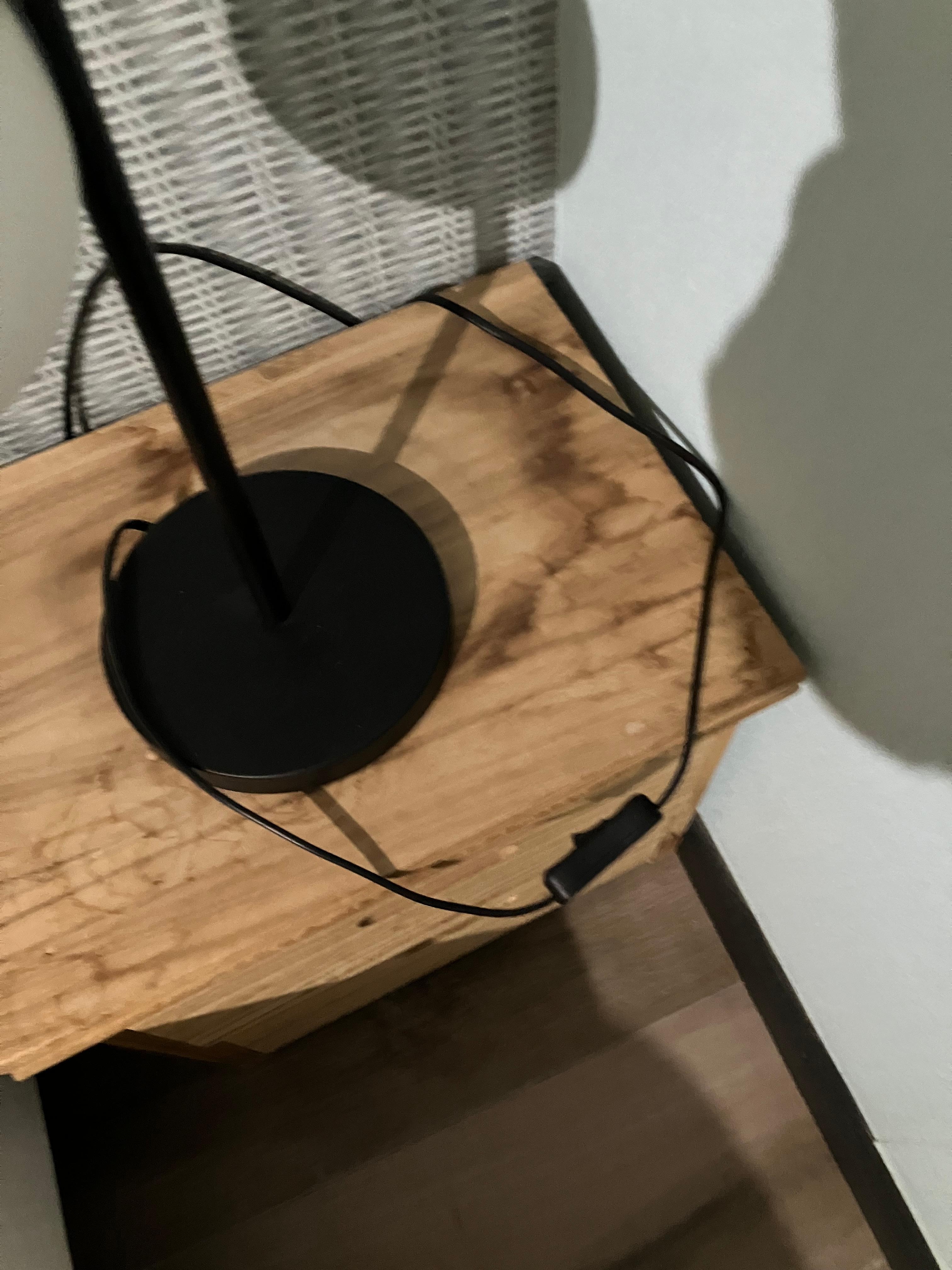 Stained bedside table with urine