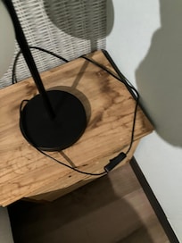 Stained bedside table with urine