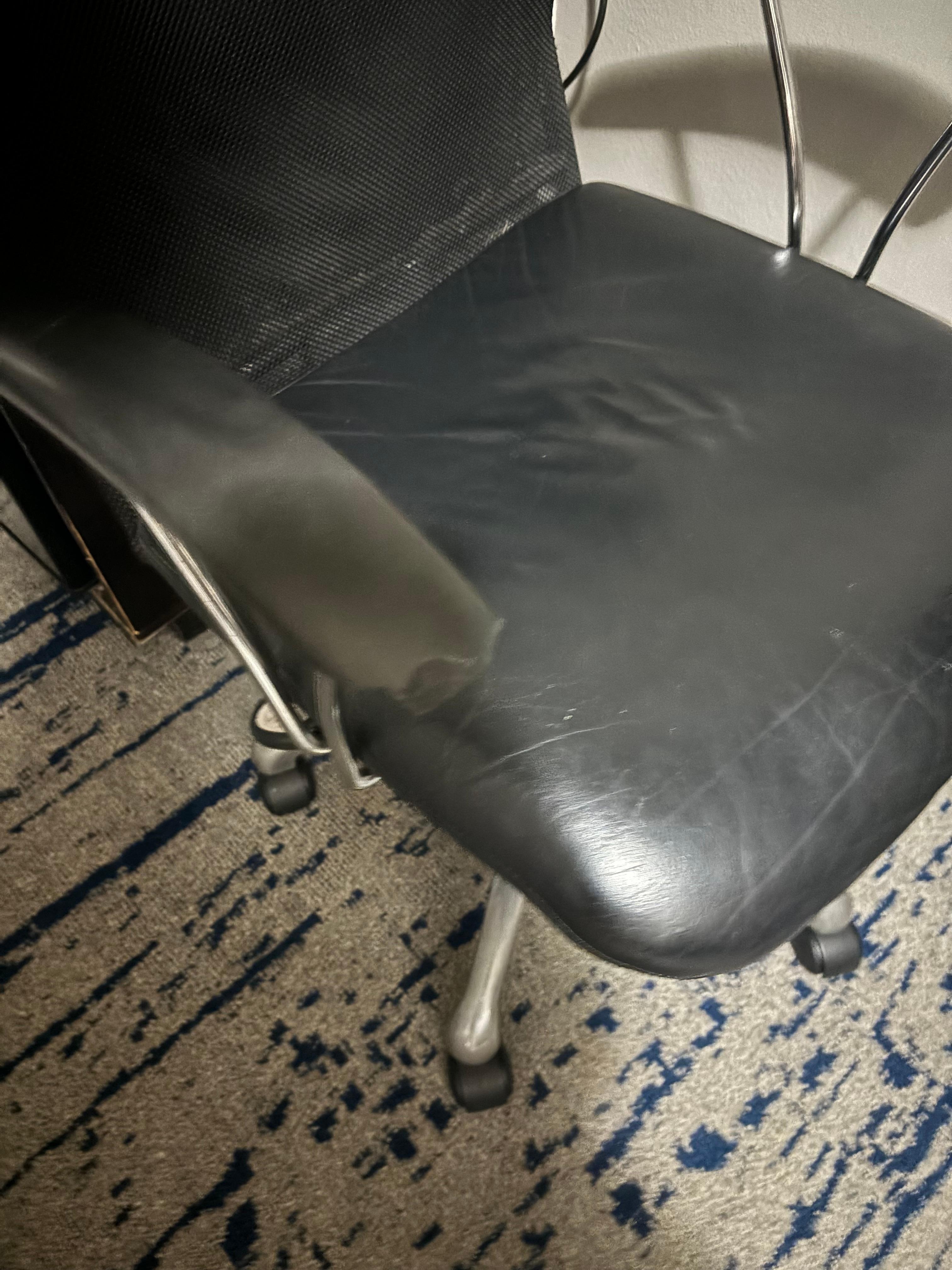 Looked like a bite was taken out of the chair arm?