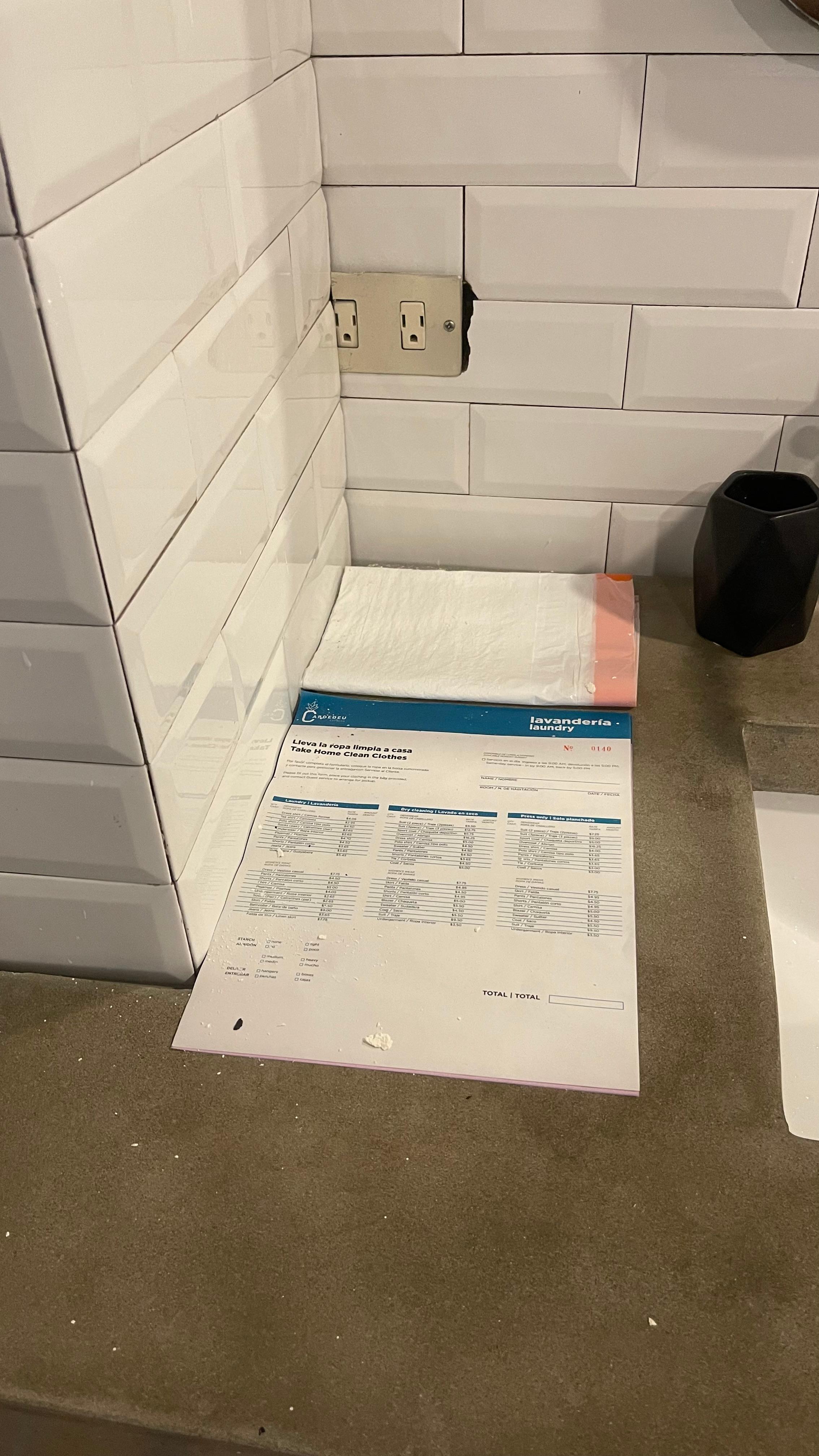 Wall crumbling on sink. 