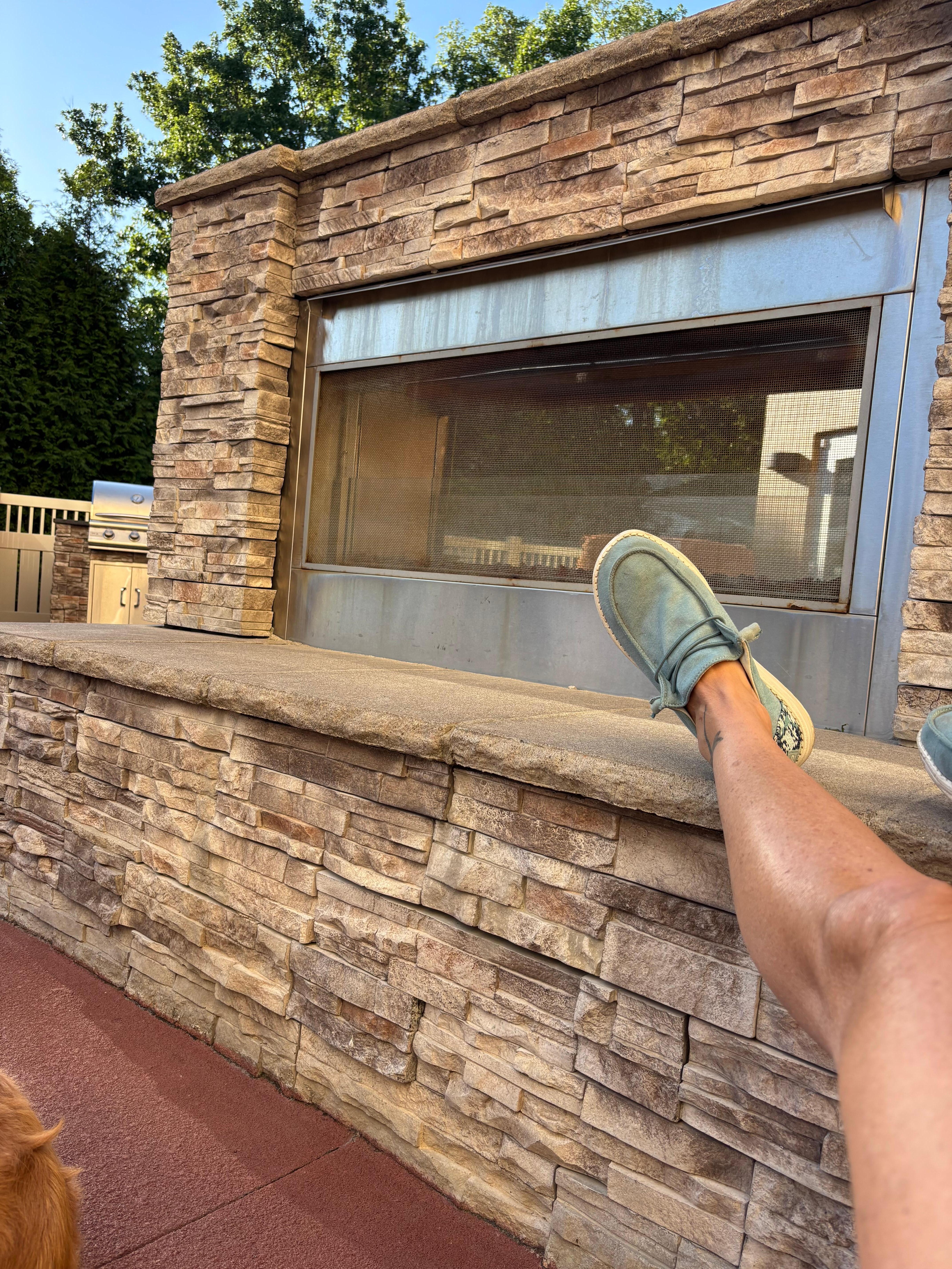 Relaxing outside on their patio 🍹