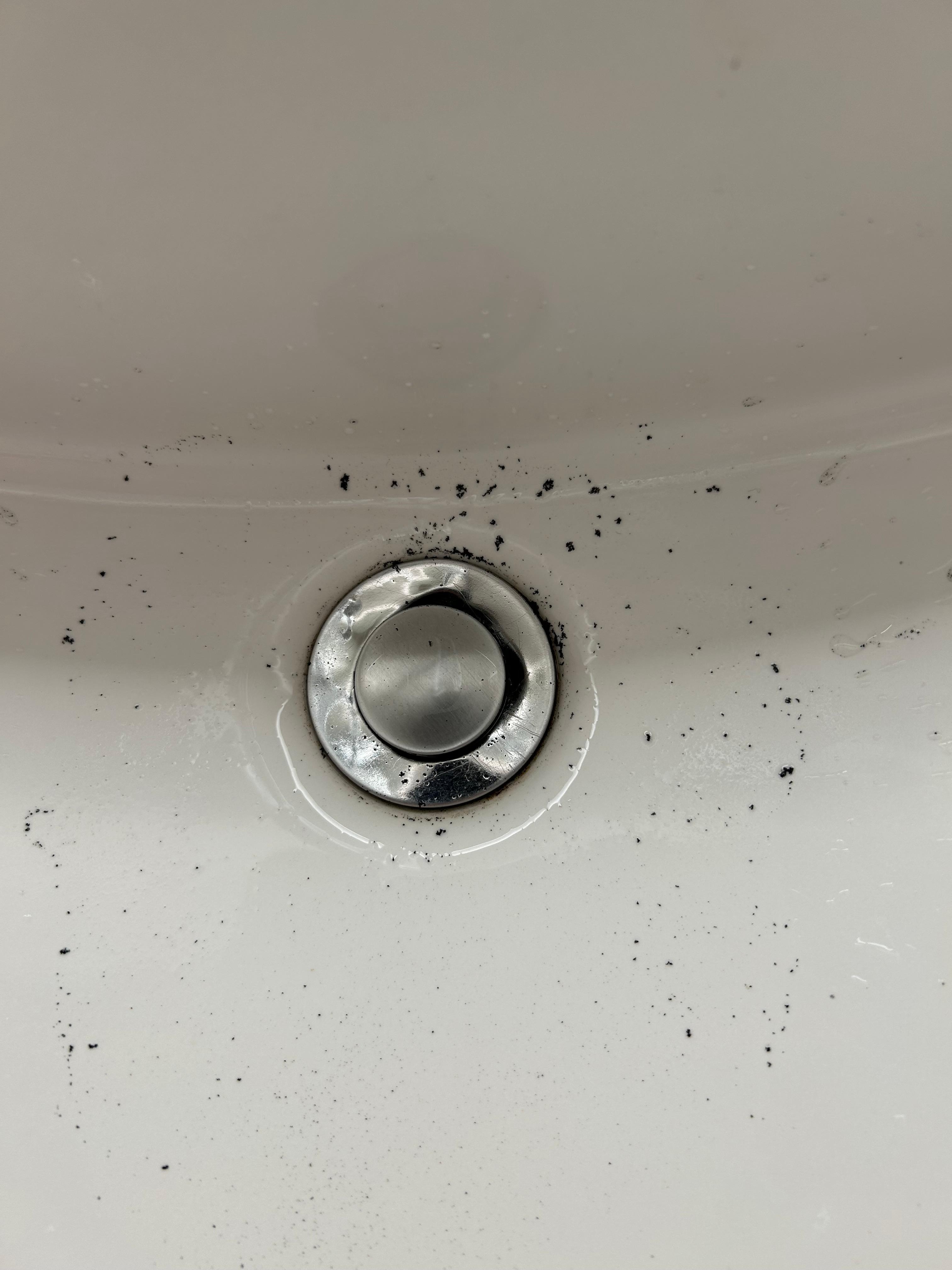 Sink in the bathroom area after turning on faucet