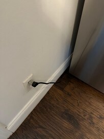 Improvised electrical setup in kitchen area @ refrigerator