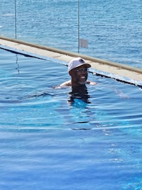 Husband in beautiful pool