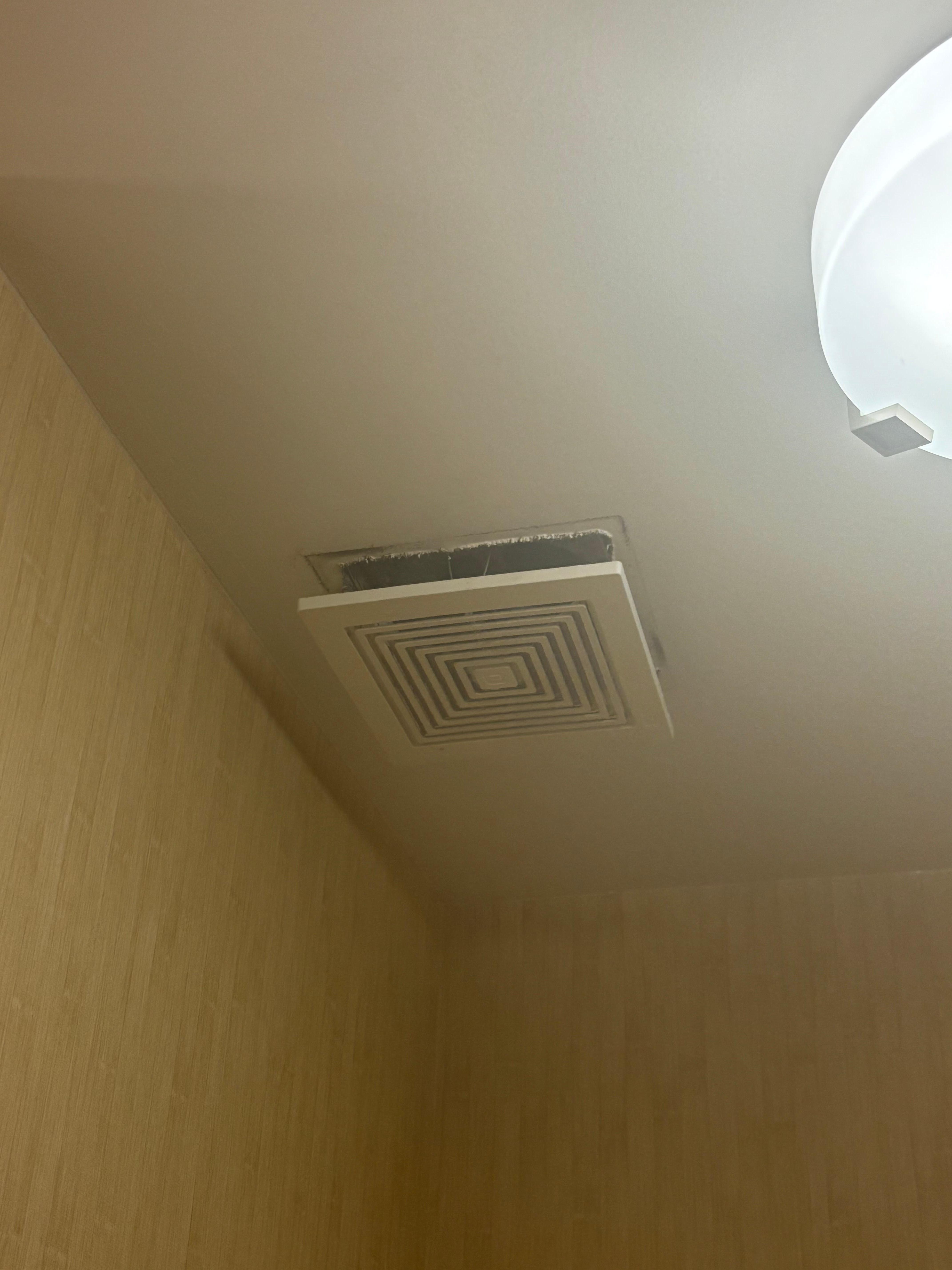 Exhaust fan filthy and hanging