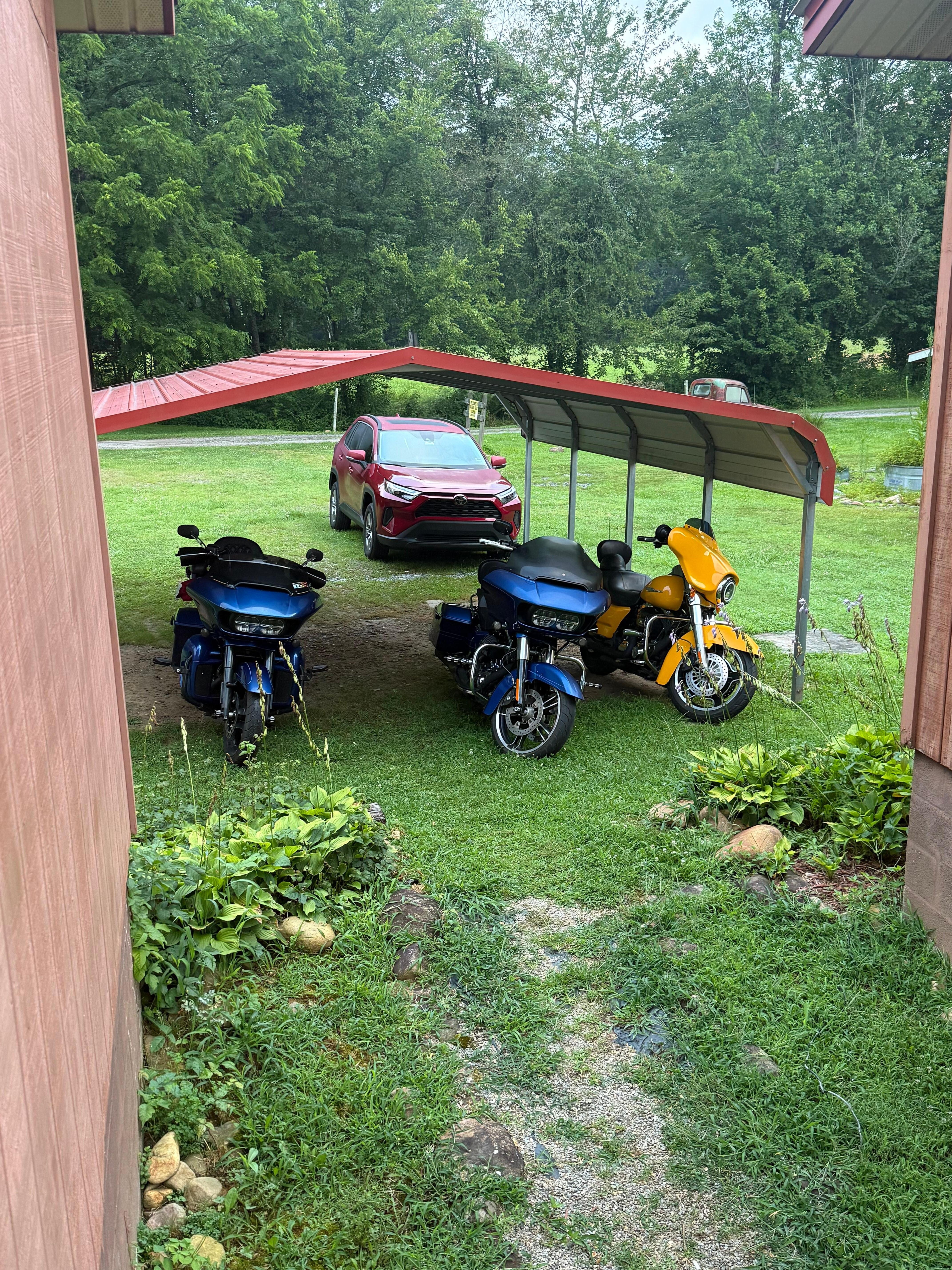 Covered bike parking. Also had paved spots for your kickstand. Just the little things that make this place a great stop for people riding the dragon and cherahola skyway. 