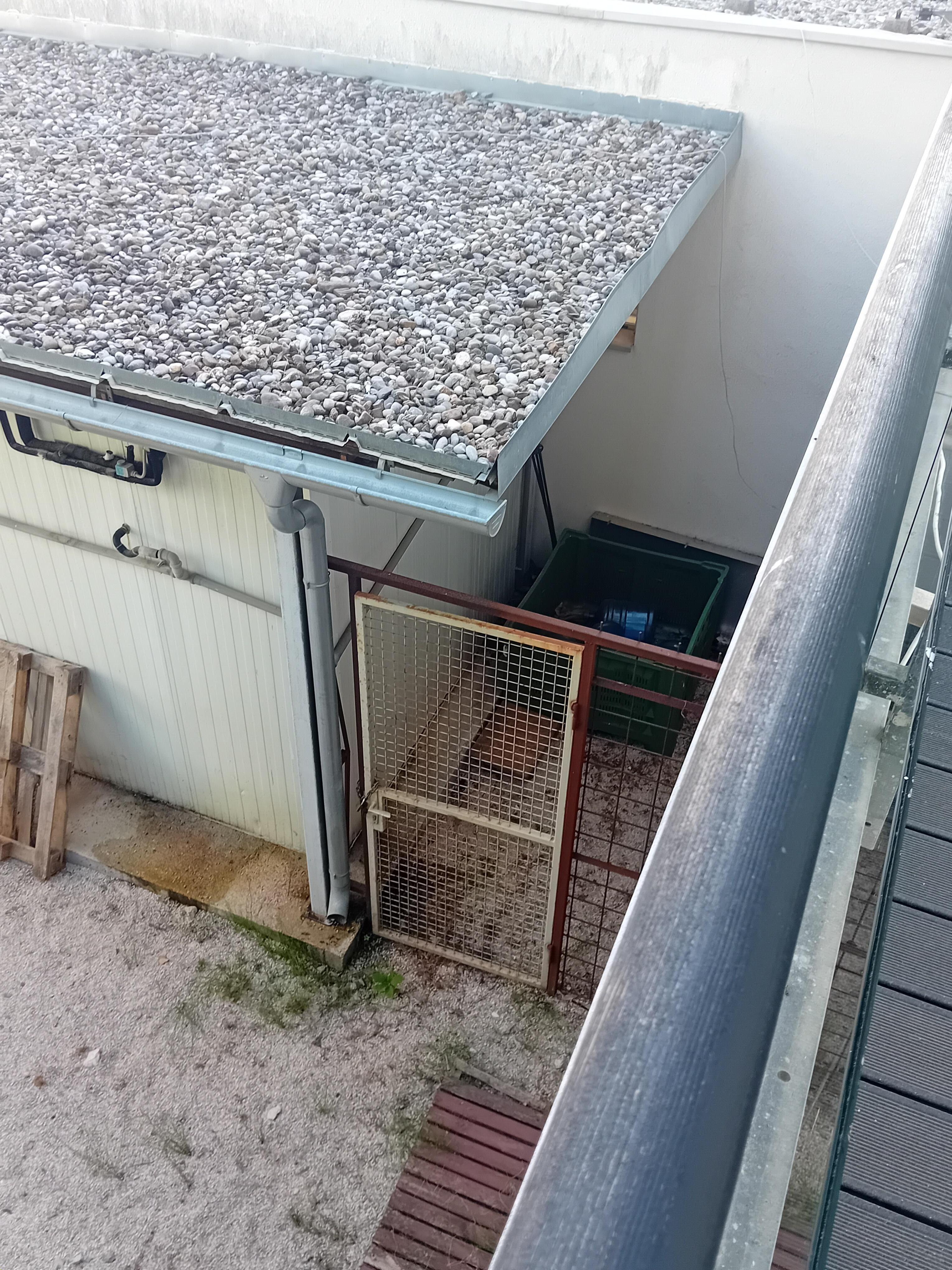 View from room 104. This was the hotel grounds. Not as described/ not a luxury hotel. Like looking into a scrap yard.
