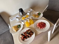 Breakfast in bed. Included with the honeymoon suite at El Dorado Seaside Suites.