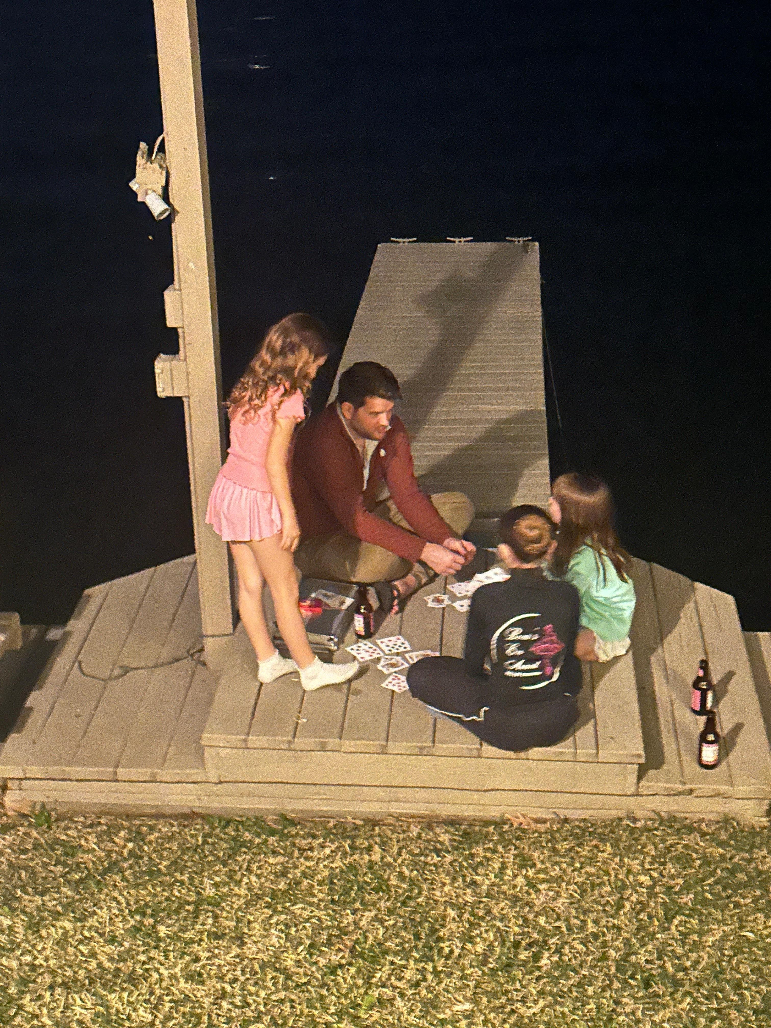 Card games on the deck. 