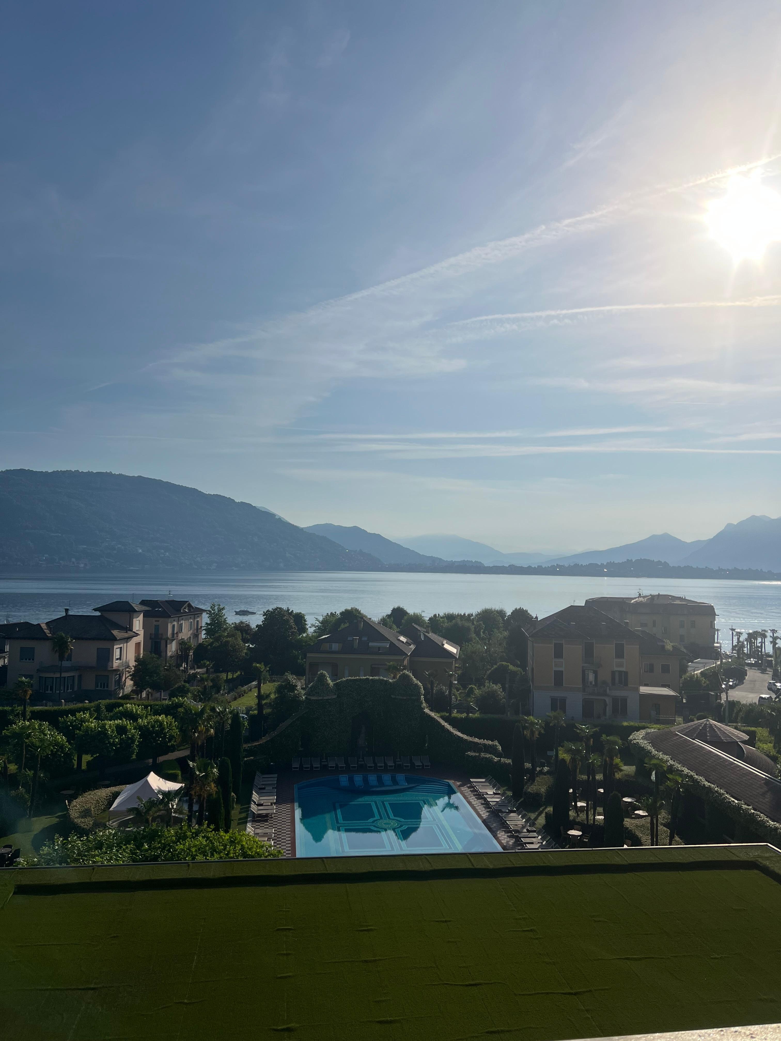 View of pool and lake from hotel room